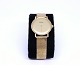 Ole Mathiesen, 
Copenhagen, 
Classic wrist 
watch. The 
watch is swiss 
made, quartz 
and gilded with 
...
