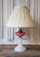Beautiful 19th 
century opaline 
lamp with oil 
container in 
pink / 
raspberry 
colored glass. 
...