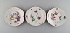 Three 
"Kakiemon" 
Meissen plates 
decorated with 
Japanese 
motifs. Ca. 
1900.
Measures: 20 
cm.
In ...