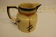 Old Jug
An old jug 
made of faience
H.: 15cm
In a good 
condition
Articleno.: 
61941