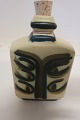Snaps can
Snaps can from 
Okela 
Stoneware, 
Denmark
Stamp at the 
bottom
H.: 18cm
W: 10cm
In a ...