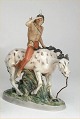 1261 American 
Indian on horse 
(LJ) 37.5 cm 
Dahl Jensen 
Marked with the 
Royal Crown and 
DJ ...