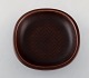 Nils Thorsson 
for Aluminia. 
"Marselis" 
faience bowl 
with geometric 
pattern in 
beautiful ox 
blood ...