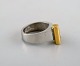 Micke Berggren, Sweden. Modernist designer ring in pewter and brass. Late 20th ...