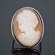 Silver cameo 
jewellery. 
A ring, set 
with a cameo, 
mounted in 
silver. Ring 
size app. 62. 
H. ...