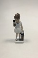 Lyngby 
Porcelain 
Figurine of 
Girl with 
Telephone, 
"Gitte" No 73. 
Measures 17 cm 
/ 6 11/16 in.