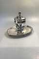 Georg Jensen 
Sterling Silver 
Inkwell No 
145(1925-1933)  
Measures H. 
18.5 cm.(7 9/32 
in) W. 18 ...