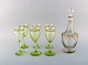 Emile Gallé 
(1846-1904). 
Six early and 
rare wine 
glasses and 
carafe in 
mouth-blown 
light green ...