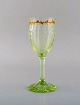 Emile Gallé 
(1846-1904). 
Early and rare 
wine glass in 
mouth-blown 
light green art 
glass with ...