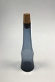 Kastrup 
Glassworks 
Opaline shape 
Blue Carafe 
with Kork. 
Measures 34 cm 
/ 13 25/64 in.