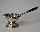 Tea strainer 
with holder in 
silver, Cohr, 
20th century. 
Fredericia, 
Denmark. 
Inside&nbsp; 
...