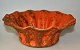 H. A Kähler bowl, uranium orange glaze, 1930s, Næstved, Denmark. Wavy edge. Stamped. H: 8.5 cm. ...