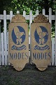 Old shop sign 
from around 
1900 in painted 
wood with a 
super fine 
patina. TH. 
Dinsen "MODES"
The ...