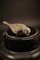 Old bronze bird 
with fine 
patina. 
H:3.5cm. L:9cm.