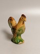 Danish 
earthenware 
Bornholm 
savings box in 
the form of a 
rooster ca. 
year 1900 
Height 13.5cm.