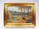 Painting with 
forest motif 
and gilded 
frame signed 
Finn 
Wennervald. The 
painting is in 
great ...