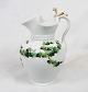 White porcelain 
chocolate jug 
decorated with 
gold and green 
colors.
24 x 14 cm.