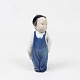 Royal porcelain 
figurine of a 
boy with a 
broom, no.: 
3250.
Dimensions: 11 
x 4 cm.
