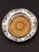 Silver-plated 
wine coaster 
with wooden 
base D. 18 cm. 
No. 418144