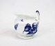 Cream jug, no.: 
8564, in Blue 
Flower by Royal 
Copenhagen.
9 x 10 cm.