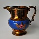 English lustra 
jug, 19th 
century. 
Decorated with 
rose. With blue 
ribbon. H .: 
14.5 cm.
Great ...