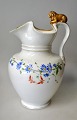 Bing & Grondahl 
lion chocolate 
jug with lid, 
19th century 
Denmark. White 
porcelain 
decorated ...