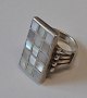 Danish sterling 
ring in silver, 
20th century 
with mother of 
pearl. 
Unclearly 
stamped. Size: 
54.