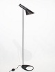 Black floor lamp designed by Arne Jacobsen in 1957 and manufactured by Louis Poulsen. The lamp ...