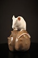 Royal 
Copenhagen 
small porcelain 
figure of white 
mouse 
sitting on 
stone.
Height: 7cm. 
...