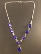 Necklace with 
blue Diamond 
cut zirconia in 
the course.
Silver 925 p
chain length: 
47 cm.
nice ...