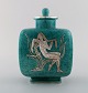 Wilhelm Kåge 
for 
Gustavsberg. 
Argenta art 
deco ceramic 
lidded jar 
decorated with 
nude woman in 
...