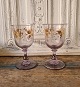 Beautiful 
French wedding 
glass, in glass 
with purple 
tone, decorated 
with leaves in 
gold. ...