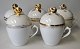 5 antique 
chocolate cups 
with lids, 19th 
century 
Germany. With 
gold 
decorations. 
With handle and 
...