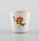 Small Meissen cup in hand-painted porcelain with flowers. 20th century.
