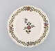 Meissen plate 
in hand-painted 
porcelain with 
floral 
decoration. 
20th century.
Diameter: 24.5 
...