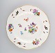 Antique Meissen 
plate in 
hand-painted 
porcelain with 
flowers and 
birds. 19th 
century.
Diameter: ...