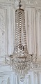 Large beautiful 
old crystal 
chandelier with 
three light 
sources. 
Appears in 
good condition. 
...