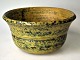 Bowl in 
stoneware, 20th 
century 
Denmark. 
Yellowish, 
greenish glaze. 
At the bottom 
square ...