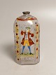 Brandy bottle 
of enamel 
decorated 
glass. Front 
with nobleman 
back with 
inscription. 
Germany 18th 
...