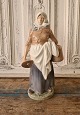 Royal 
Copenhagen 
figure - Milk 
girl 
No. 899, 
Factory first. 
Height 28 cm. 
Design: ...