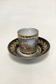 A Sevres 
Porcelain 
Cabinet Cup and 
Saucer, 1844. 
The dark blue 
and gilt cup 
with a scenery 
of a ...