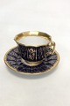 Early 
(1820-1850) 
Royal 
Copenhagen Cup 
and saucer. 
Dark blue Huge 
12-sided cup 
with gilt ...