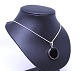 Necklace with 
Onyx pendant of 
925 sterling 
silver stamped 
Dsi.
2 cm.