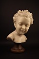 Decorative, old French bust made of wax on wooden base.Height: 30cm.