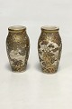 Pair of 
Japanese 
Satsuma vases, 
Meiji period. 
Decorated with 
Tsuba, 
Chrysanthemum, 
flowers etc. 
...