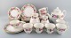 Royal 
Worcester, 
England. 
Complete tea 
service for 
seven people in 
porcelain with 
floral motifs. 
...