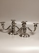 A pair of 
three-armed 
candlesticks of 
three-tower 
silver COHR 
Height 15.5cm 
Length 30cm. 
Appears ...