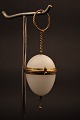 Decorative 1800 
century perfume 
egg in white 
opal glass with 
bronze mounts 
and small 
chain. H: ...
