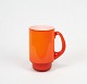 Red glass mug 
with white 
opaline glass 
on the inside 
from the Palet 
series by 
Michael Bang 
for ...