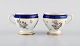 Sevres, France. 
Two antique 
cream cups in 
hand-painted 
porcelain with 
flowers and 
gold ...